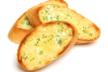 can dogs eat garlic bread