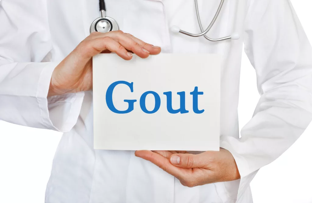 Gout card in hands of Medical Doctor